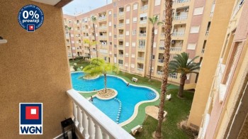 Mieszkanie na  sprzedaż Torrevieja - Ładny apartament z basenem osiedlowym